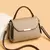 Bolsa mensageiro feminina de ombro na internet