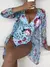 Maiô estampado tropical com decote em V na internet