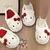 Pantufa de pelúcia Hello Kitty branquinha - loja online