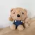 Urso de pelúcia bolsa de ombro na internet