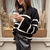 SWEATER RAYAS - NEGRO CON BLANCO