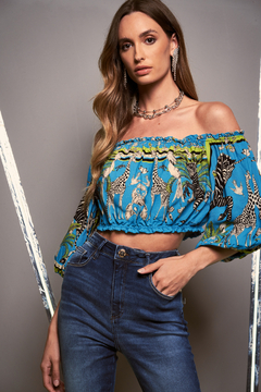 BLUSA ESTAMPADA TRITON OMBO A OMBRO