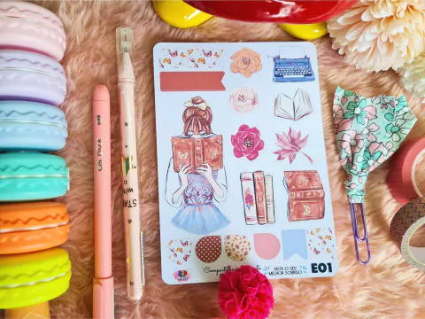 Cartela de adesivos com meninas, incluindo ilustrações de livros, flores 
