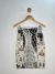 Saia Secretária Bege e Preta Estampada TAM.P CÓD.128 - comprar online
