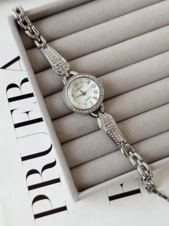 Reloj Eva plateado f.blanco