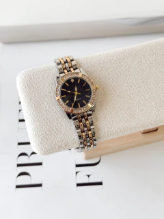 Reloj Reini dorado en internet