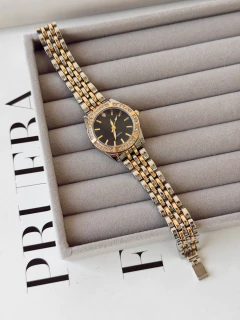 Reloj Reini dorado