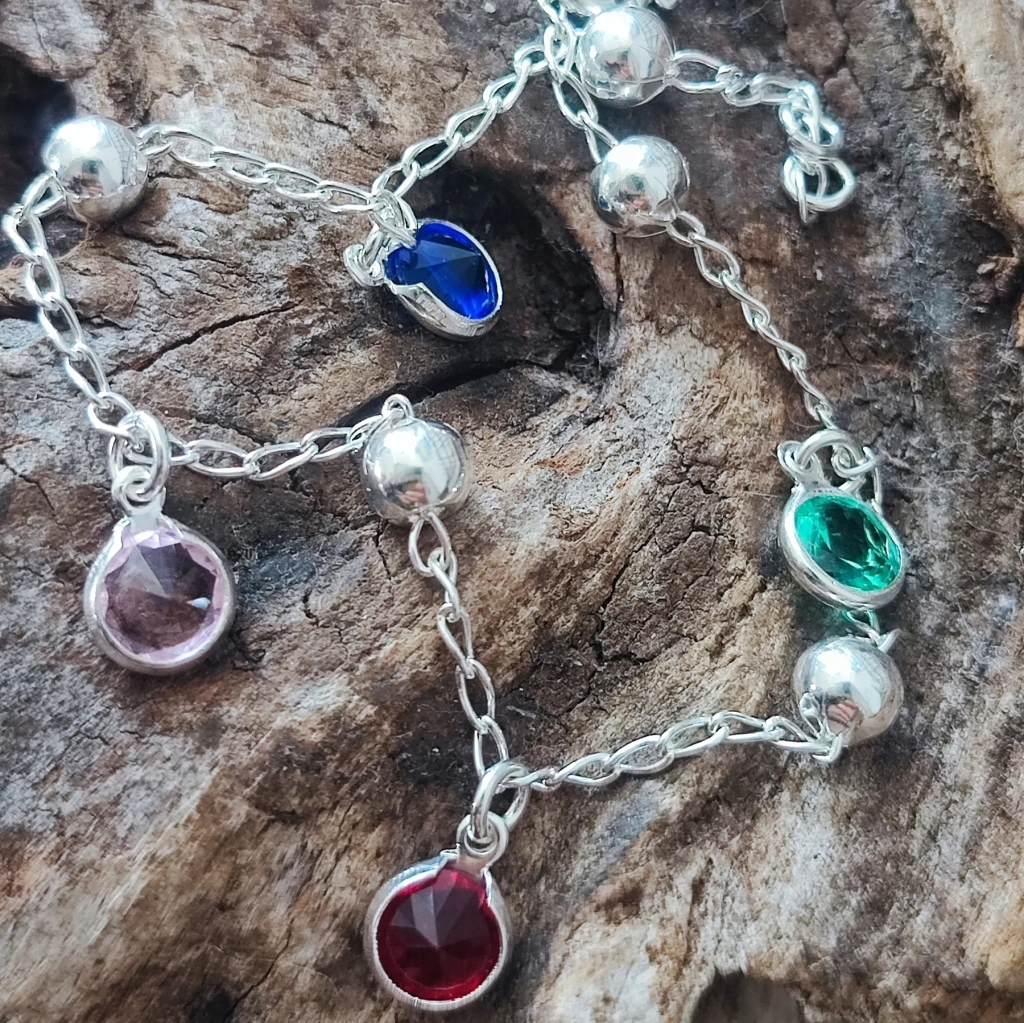 Pulseira com cristal e bolas intercaladas