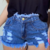 Imagem do Short Jeans Feminino com Barra Desfiada Estilo Detonado Blogueira Gringa