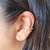 Piercing "X" Fake Cravejado Zircônias - comprar online