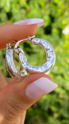 par de aros de plata inflada