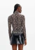 BLUSA LANÇA PERFUME DE TULE GOLA ALTA ESTAMPADA - comprar online