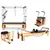 Complete Pilates studio equipment set including reformer, tower, chair, and spine corrector in wood and black padding