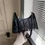 Bolsa de ombro - USE  &  ABUSE 