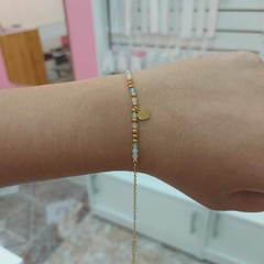 Pulsera con Pelotitas y Corazón.