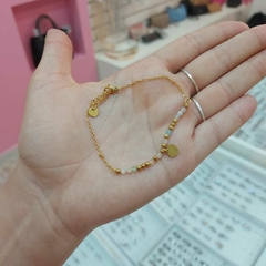Pulsera con Pelotitas y Corazón. - comprar online