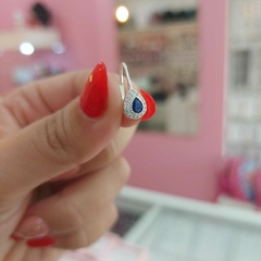 Argollitas Tipo Gotitas con Piedra Azul. - comprar online