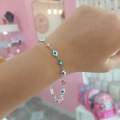 Pulsera Flores y Ojitos. - comprar online
