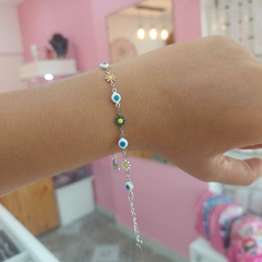 Pulsera Flores y Ojitos.