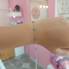 Pulsera Finita Estrellas con Pelotitas. en internet