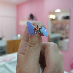 Aros Pasantes Flor con Piedritas Multicolor. - comprar online