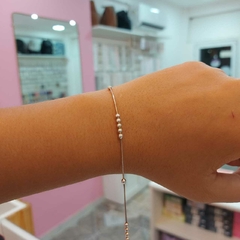 Pulsera con Cinco Pelotitas Juntitas y Separadas. - comprar online