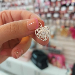 Dije Corazón.
