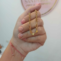 Conjunto con Tres Corazones y Alitas.