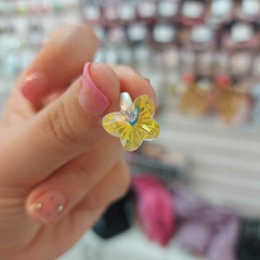 Dije Mariposa.