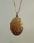 Colar relicário oval folheado a ouro 18k na internet