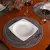 Jogo Americano Trançado Redondo: Elegância e Praticidade para Sua Mesa de Jantar