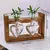 Imagem do Vaso de Vidro com Moldura de Madeira: Elegância e Naturalidade para Sua Decoração