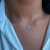 GARGANTILHA SILICONE olho grego em madre perola