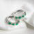 Brincos Esmeraldas e Diamantes. Ouro branco 18k. Em Estoque.