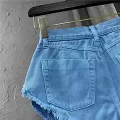 Shorts Cortos Rasgados con Borlas en internet