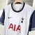 Camisa Tottenham I 24/25 - Torcedor Nike - Branca com detalhes em azul