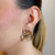 BRINCO FLOR BANHADO NO OURO ROSE 18 K