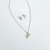 Imagen de collar con aretes de inicial acero inoxidable