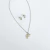 Imagen de collar con aretes de inicial acero inoxidable
