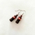 Aretes coca cola
