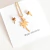 Juego collar con aretes palmera acero inox