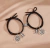 Dúo de pulseras en pareja imán araña en internet