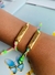 Pulseiras de macramê colorido Rainbow com passante Vitória e Felicidade - comprar online