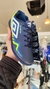 Chuteira society umbro na internet