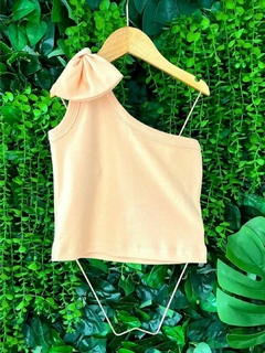 Blusa Menina Um Ombro e Laço-Boladinhos. na internet