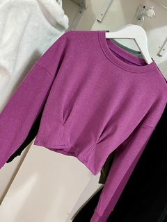Sweater con pinzas en internet