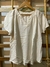 Blusa blanca escote V