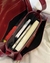 cherry red saddle bag en internet