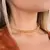 Choker Esferas Multi Tamanhos (Ajustável) (10g) (Banho Ouro 24k) - comprar online