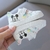 Sapatos casuais brancos Disney para bebê na internet